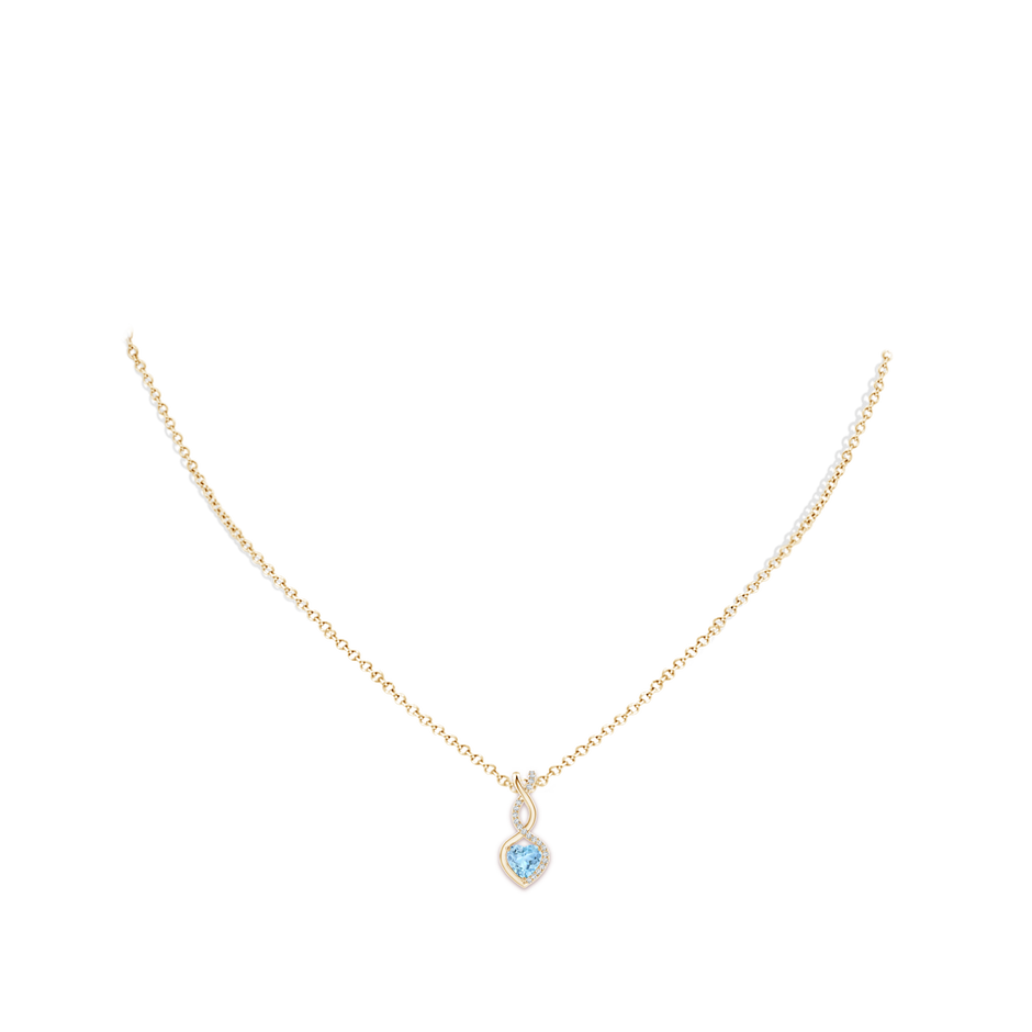 5mm AAA Heart-Shaped Aquamarine Infinity Pendant with Diamond Accents in Yellow Gold pen
