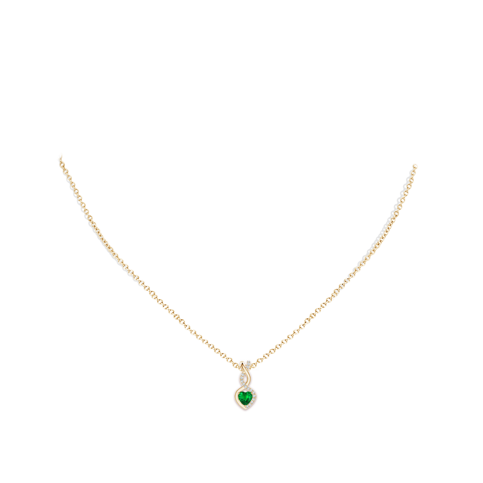 4mm AAAA Heart-Shaped Emerald Infinity Pendant with Diamond Accents in 9K Yellow Gold pen