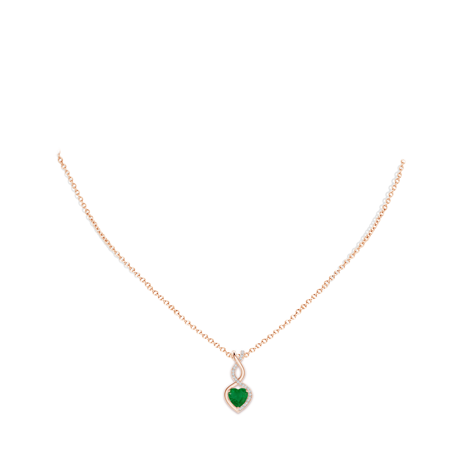 7mm A Heart-Shaped Emerald Infinity Pendant with Diamond Accents in Rose Gold pen
