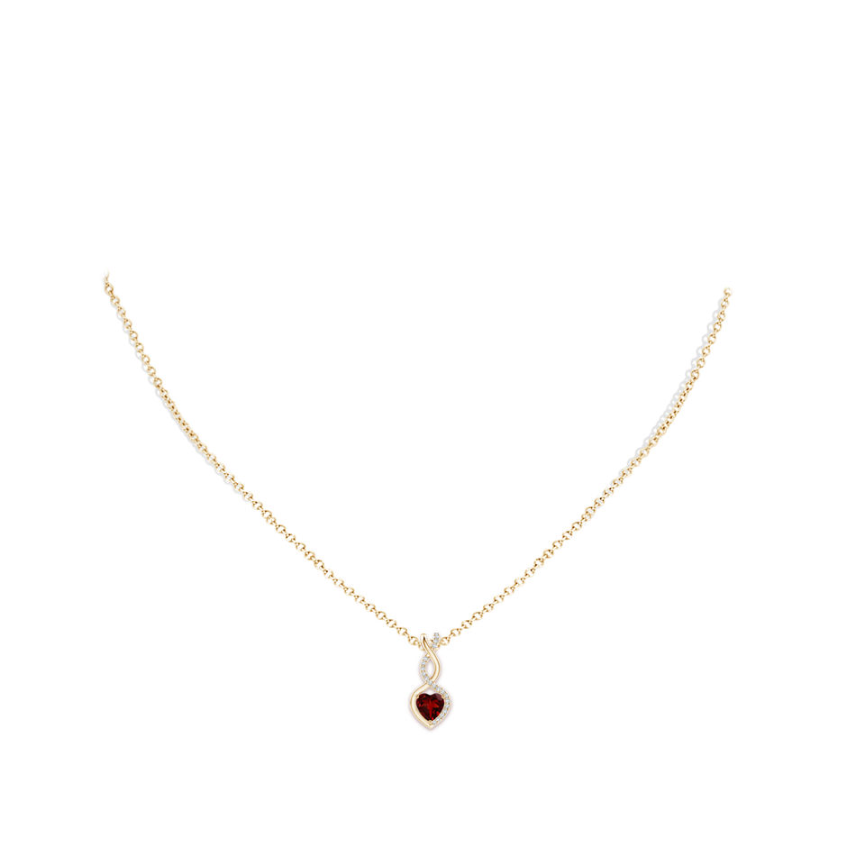 5mm AAAA Heart-Shaped Garnet Infinity Pendant with Diamond Accents in Yellow Gold pen