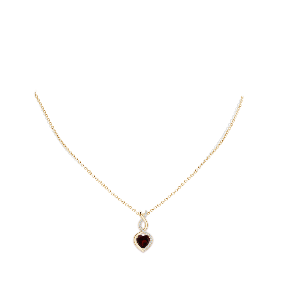 8mm A Heart-Shaped Garnet Infinity Pendant with Diamond Accents in 9K Yellow Gold pen