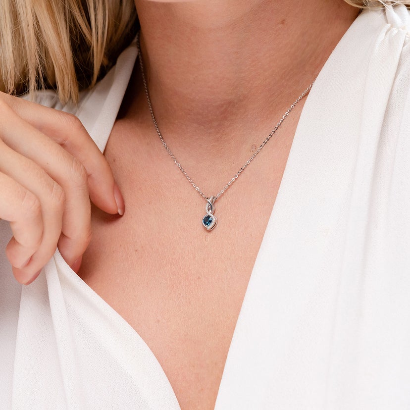 Sterling Silver Blue Topaz Heart Pendant Necklace - Bezel-Set Gemstone On 18" Rolo Chain