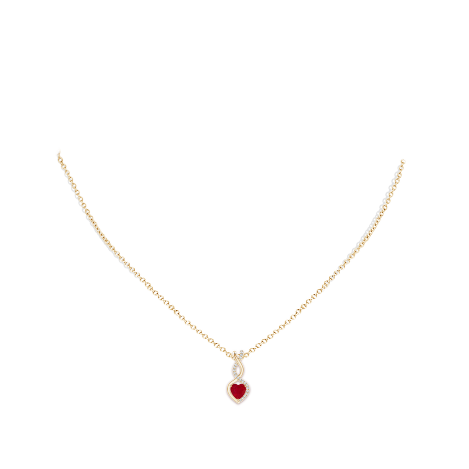 5mm AA Heart-Shaped Ruby Infinity Pendant with Diamond Accents in Yellow Gold pen