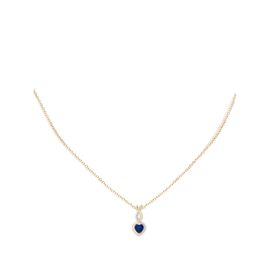 5mm AA Heart-Shaped Blue Sapphire Infinity Pendant with Diamond Accents in Yellow Gold pen