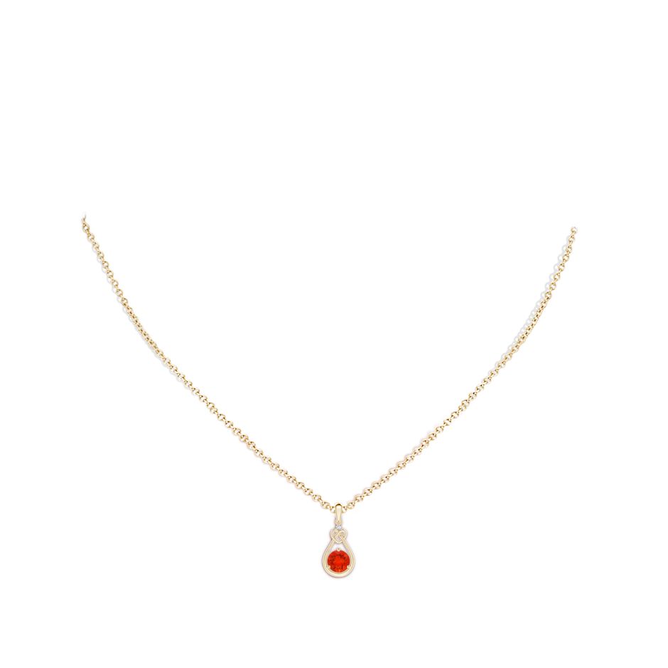 5mm AAAA Fire Opal Knotted Heart Pendant with Diamond in Yellow Gold body-neck