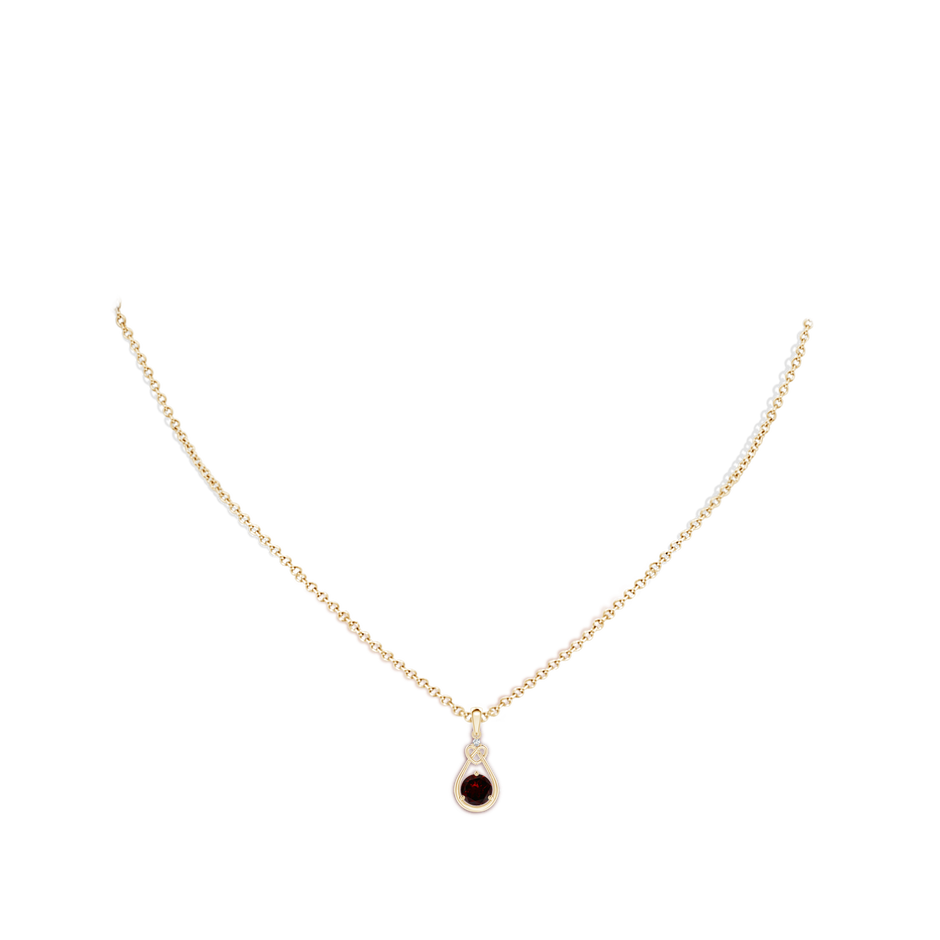 5mm A Garnet Knotted Heart Pendant with Diamond in Yellow Gold body-neck