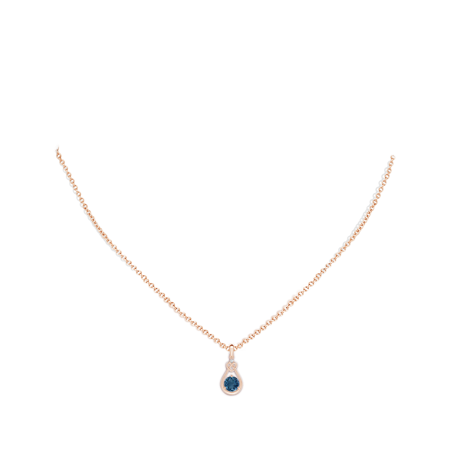 5mm AA London Blue Topaz Knotted Heart Pendant with Diamond in Rose Gold body-neck