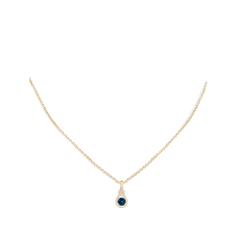 5mm AAA London Blue Topaz Knotted Heart Pendant with Diamond in Yellow Gold body-neck