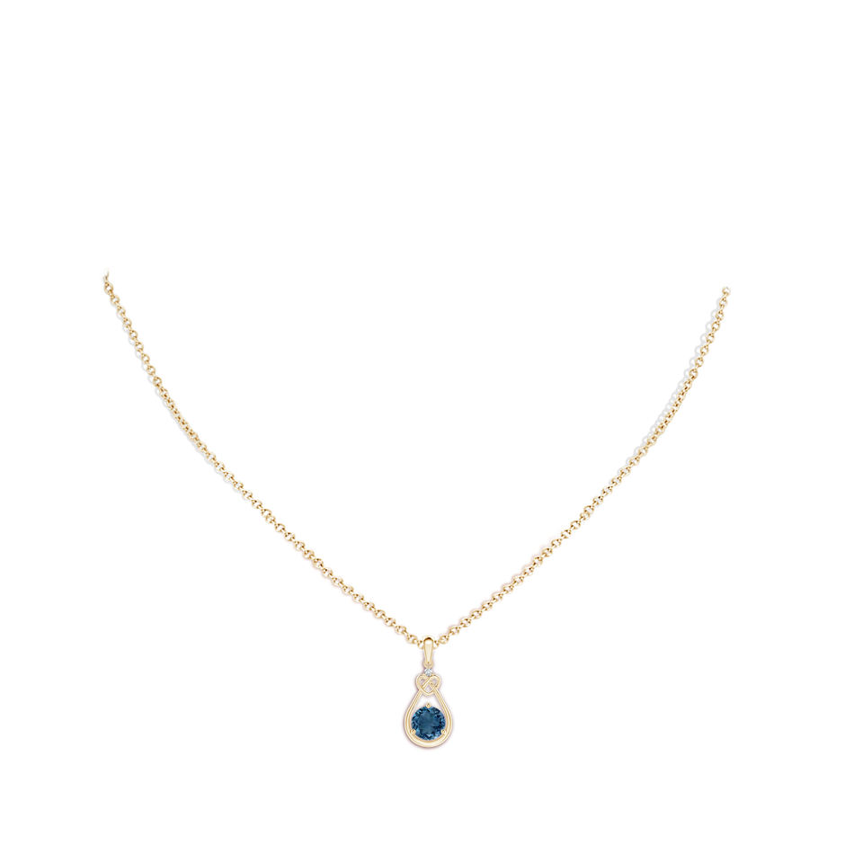 6mm AA London Blue Topaz Knotted Heart Pendant with Diamond in Yellow Gold body-neck