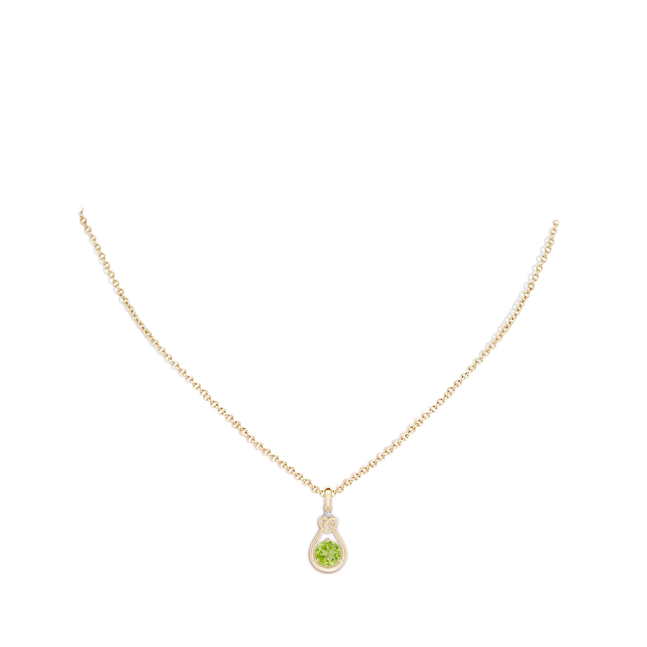 6mm AA Peridot Knotted Heart Pendant with Diamond in Yellow Gold body-neck