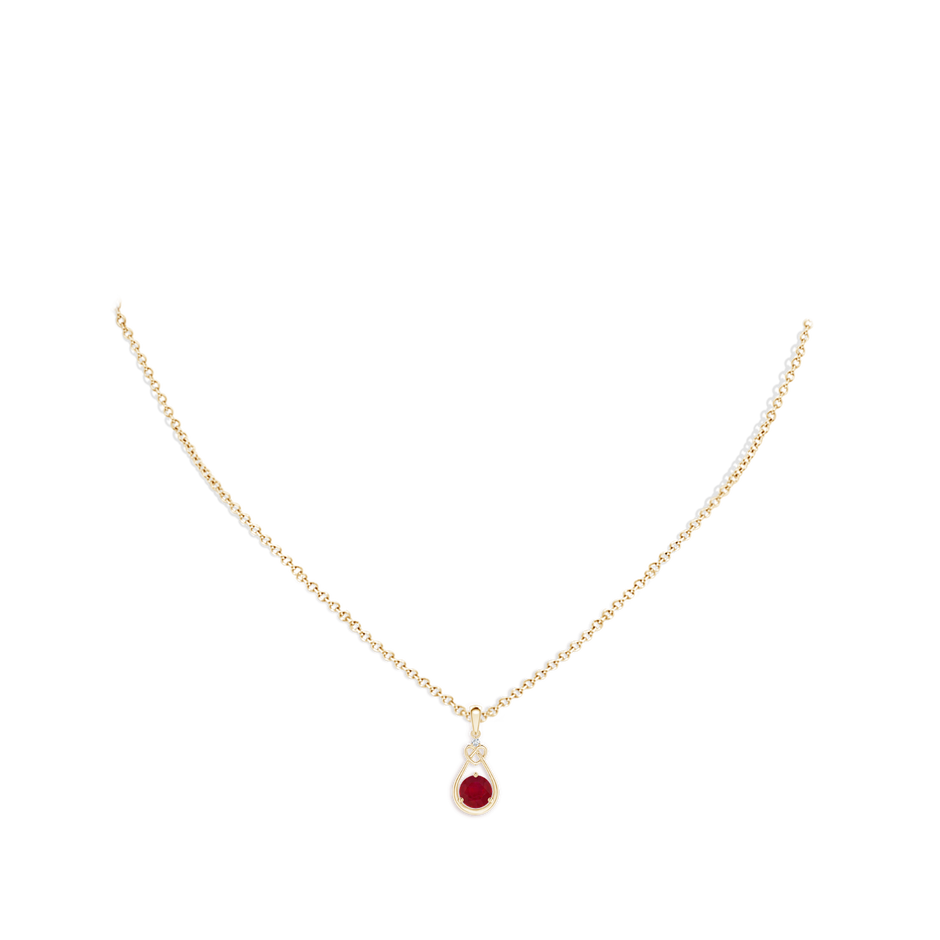 5mm AA Ruby Knotted Heart Pendant with Diamond in Yellow Gold pen