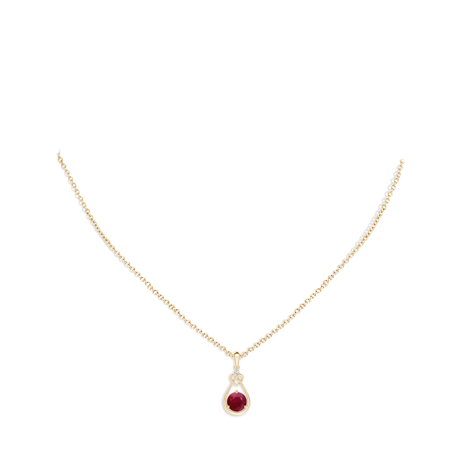 6mm A Ruby Knotted Heart Pendant with Diamond in Yellow Gold pen