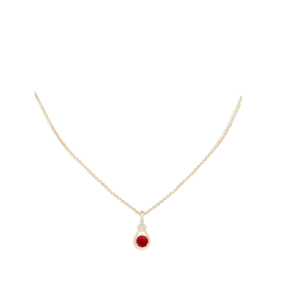 6mm AAA Ruby Knotted Heart Pendant with Diamond in Yellow Gold pen