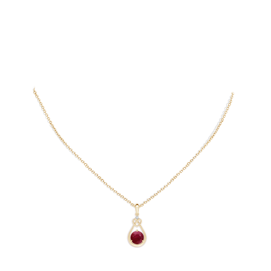 7mm A Ruby Knotted Heart Pendant with Diamond in Yellow Gold pen