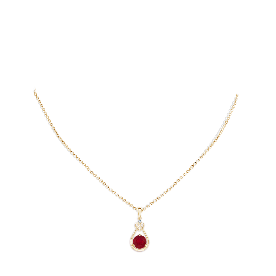 7mm AA Ruby Knotted Heart Pendant with Diamond in Yellow Gold pen