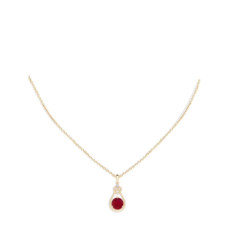 8mm AA Ruby Knotted Heart Pendant with Diamond in Yellow Gold pen
