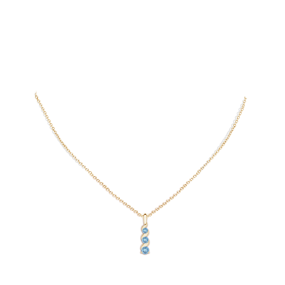 4mm AAAA Channel-Set Round Aquamarine Three Stone Journey Pendant in Yellow Gold body-neck