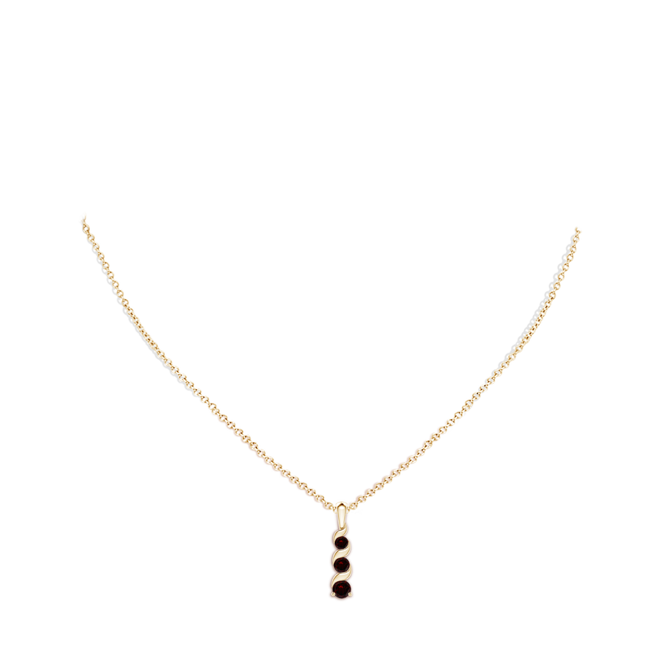 4mm A Channel-Set Round Garnet Three Stone Journey Pendant in Yellow Gold body-neck