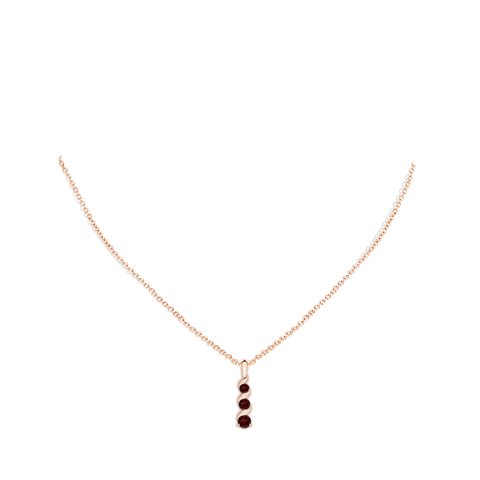 4mm AAA Channel-Set Round Garnet Three Stone Journey Pendant in Rose Gold body-neck