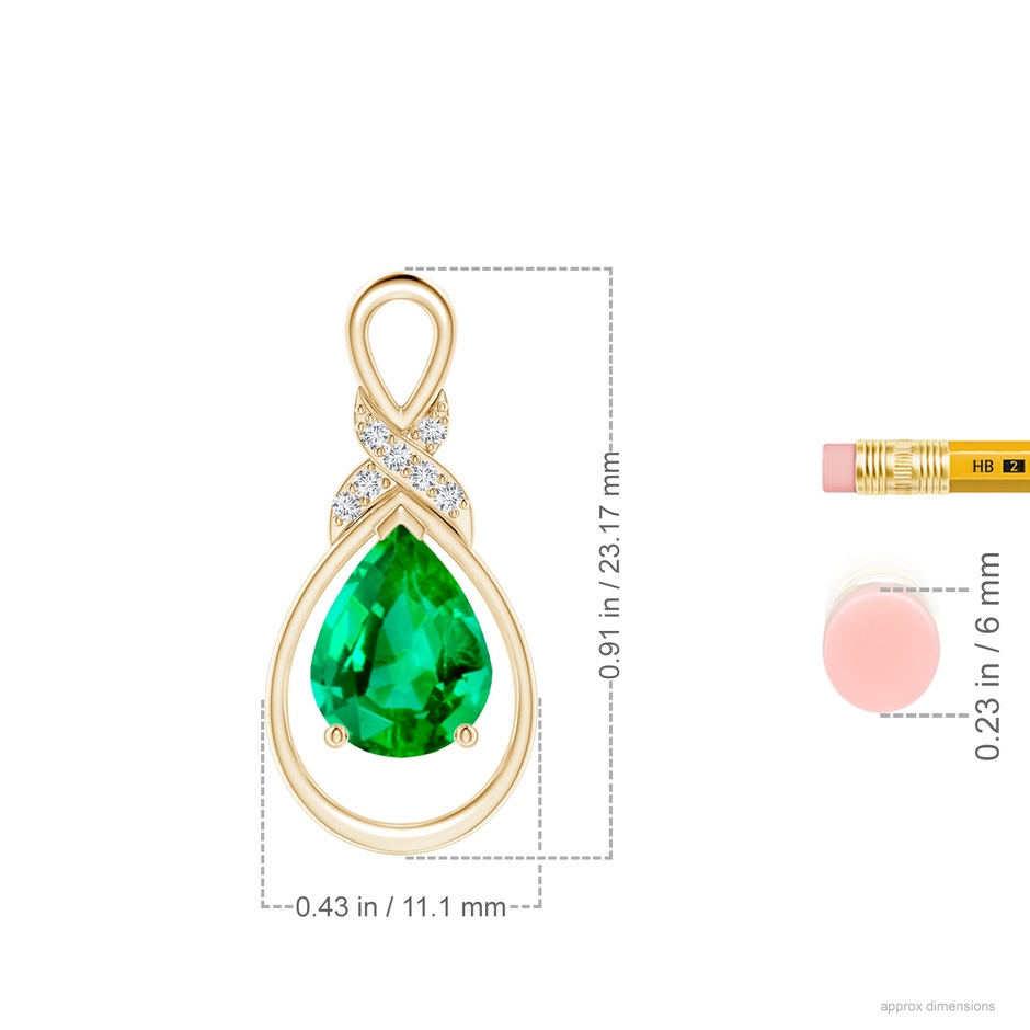 9x7mm AAA Emerald Infinity Pendant with Diamond 'X' Motif in Yellow Gold ruler