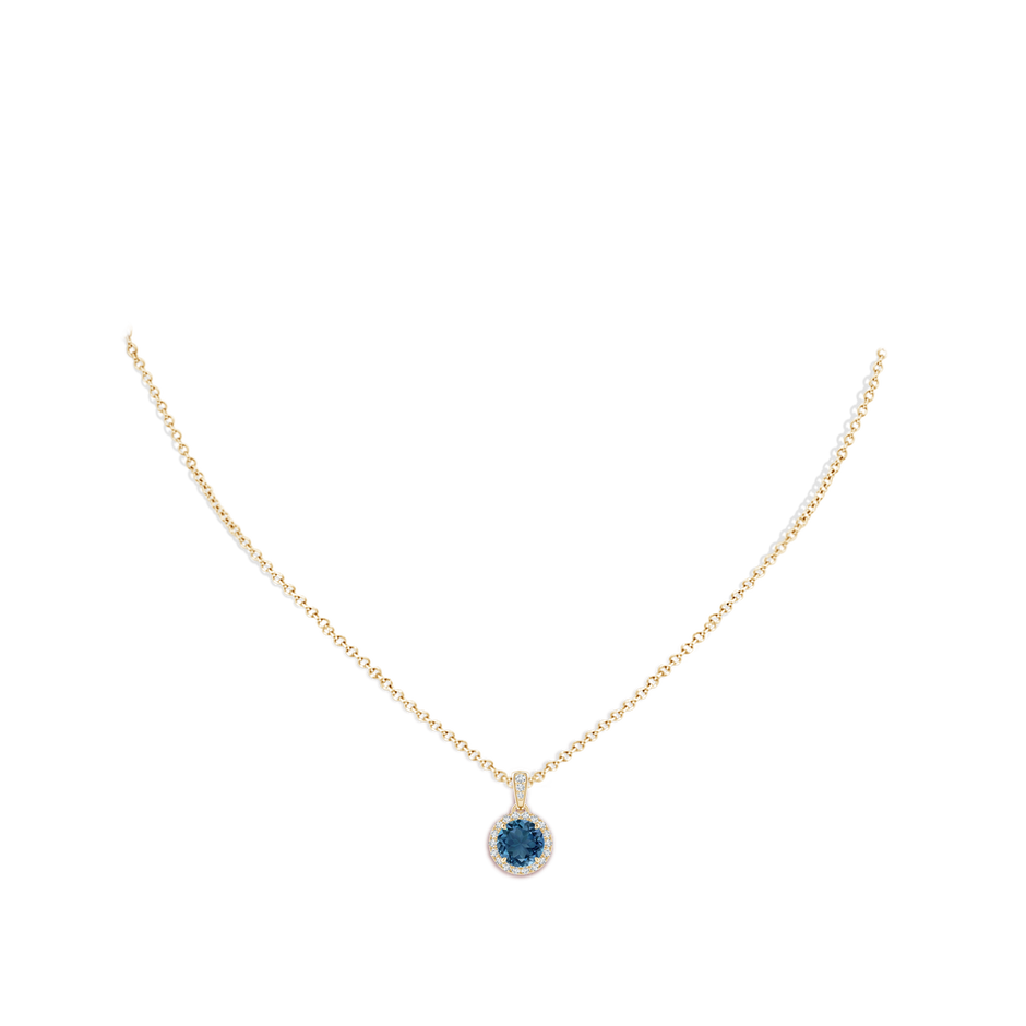 7mm AA Claw-Set Round London Blue Topaz Pendant with Diamond Halo in 10K Yellow Gold pen