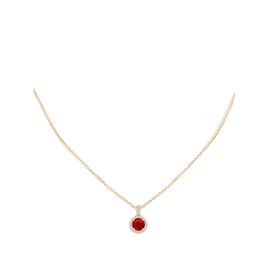 7mm AAA Claw-Set Round Ruby Pendant with Diamond Halo in Yellow Gold pen