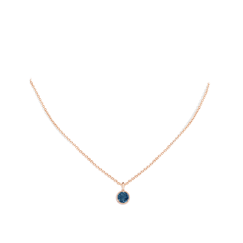 7mm AA Rope-Framed Claw-Set London Blue Topaz Solitaire Pendant in Rose Gold body-neck