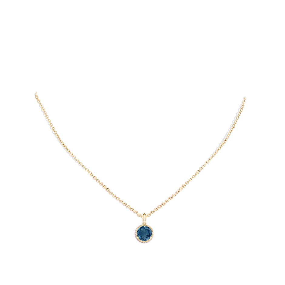8mm AA Rope-Framed Claw-Set London Blue Topaz Solitaire Pendant in Yellow Gold body-neck