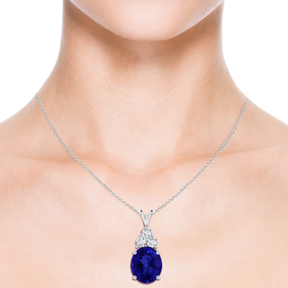 16.09x13.82x11.90mm AAAA GIA Certified Tanzanite Solitaire Pendant with Trio Diamonds in 9K White Gold body-neck