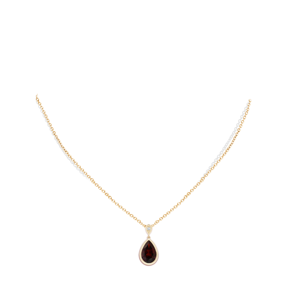 12x8mm A Bezel-Set Garnet Teardrop Pendant with Diamond in Yellow Gold pen