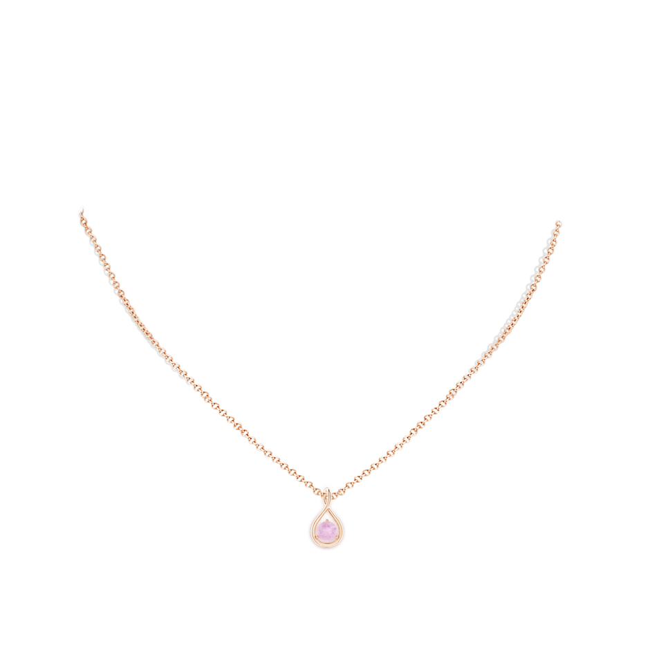 5mm AAAA Solitaire Round Rose Quartz Infinity Twist Pendant in Rose Gold body-neck