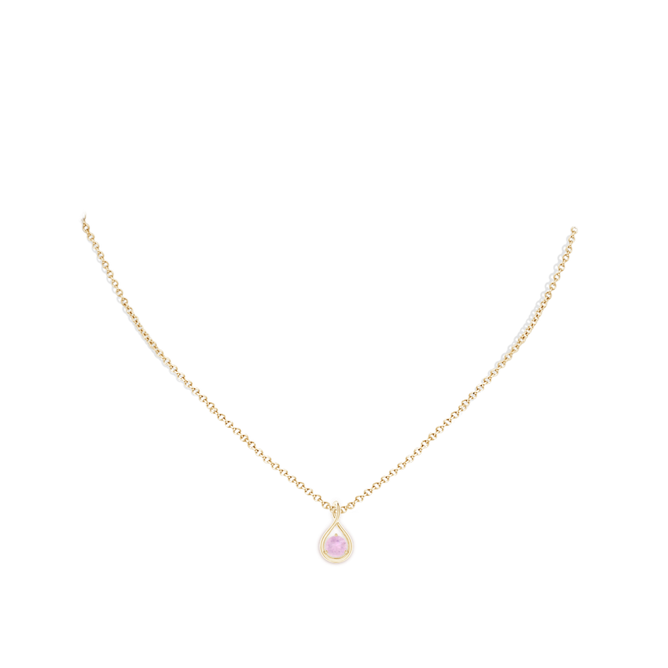 5mm AAAA Solitaire Round Rose Quartz Infinity Twist Pendant in Yellow Gold body-neck
