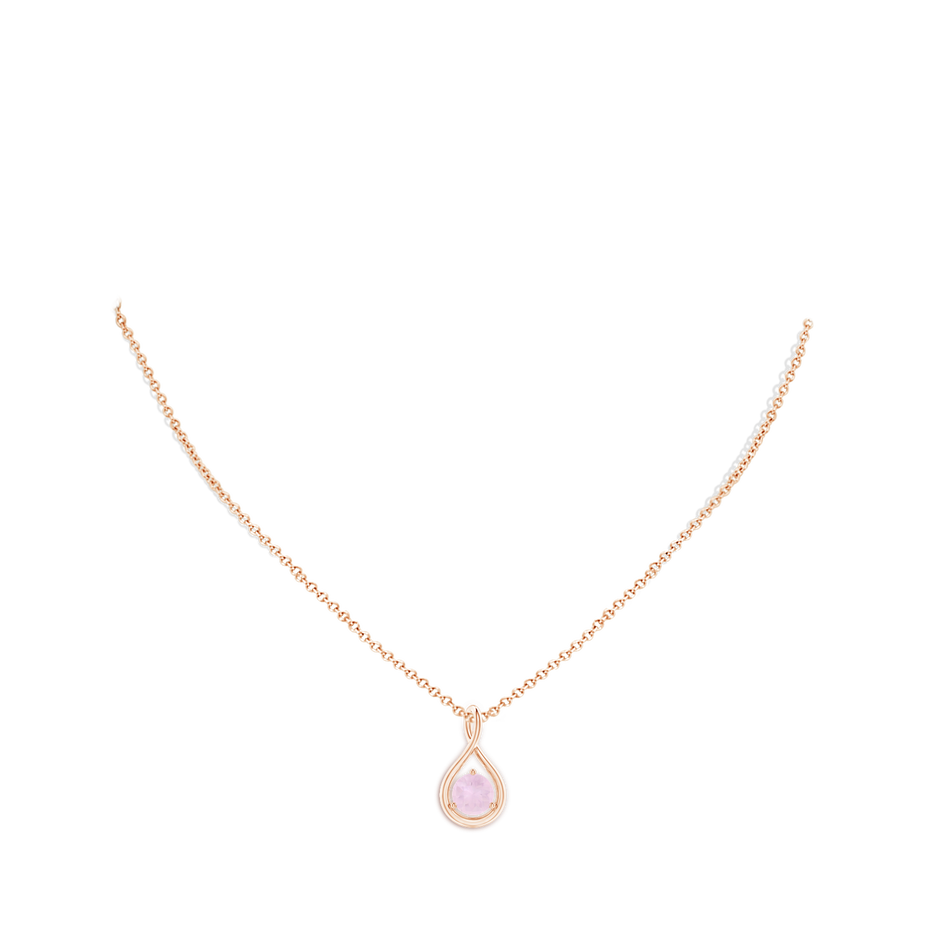 7mm AA Solitaire Round Rose Quartz Infinity Twist Pendant in Rose Gold body-neck