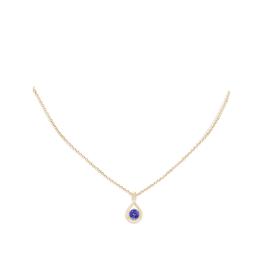 6mm AA Solitaire Round Tanzanite Infinity Twist Pendant in Yellow Gold pen