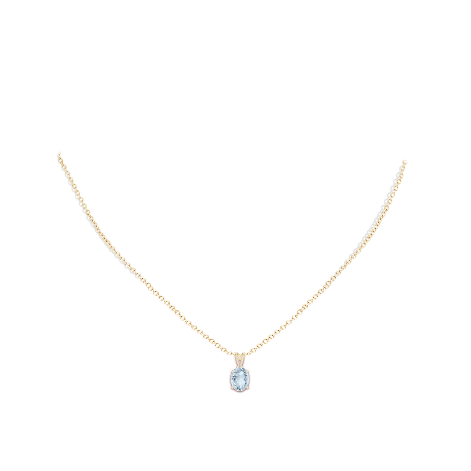 8x6mm A Vintage Inspired Solitaire Oval Aquamarine Pendant in Yellow Gold body-neck