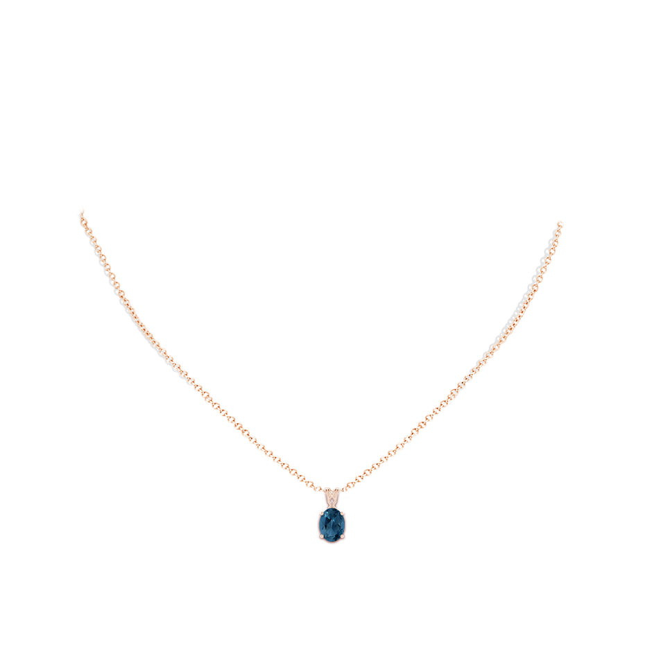 8x6mm AA Vintage Inspired Solitaire Oval London Blue Topaz Pendant in Rose Gold body-neck