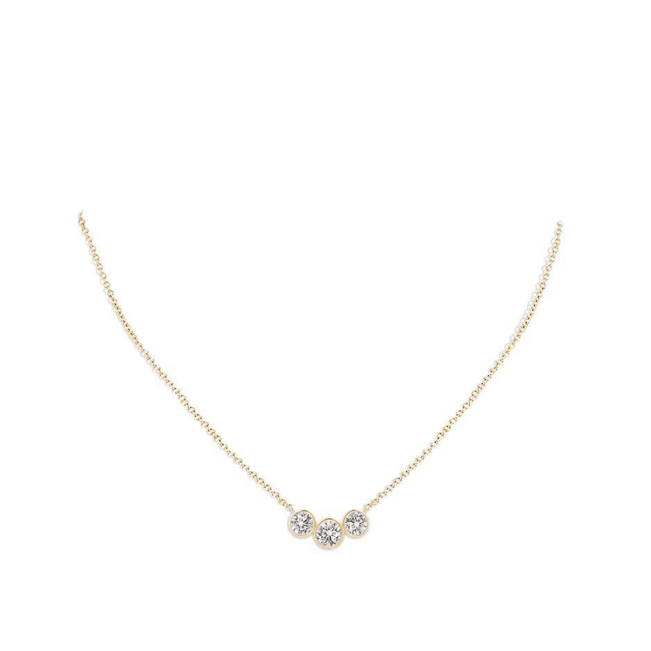 4.7mm IJI1I2 Three Stone Bezel-Set Round Diamond Pendant in Yellow Gold pen