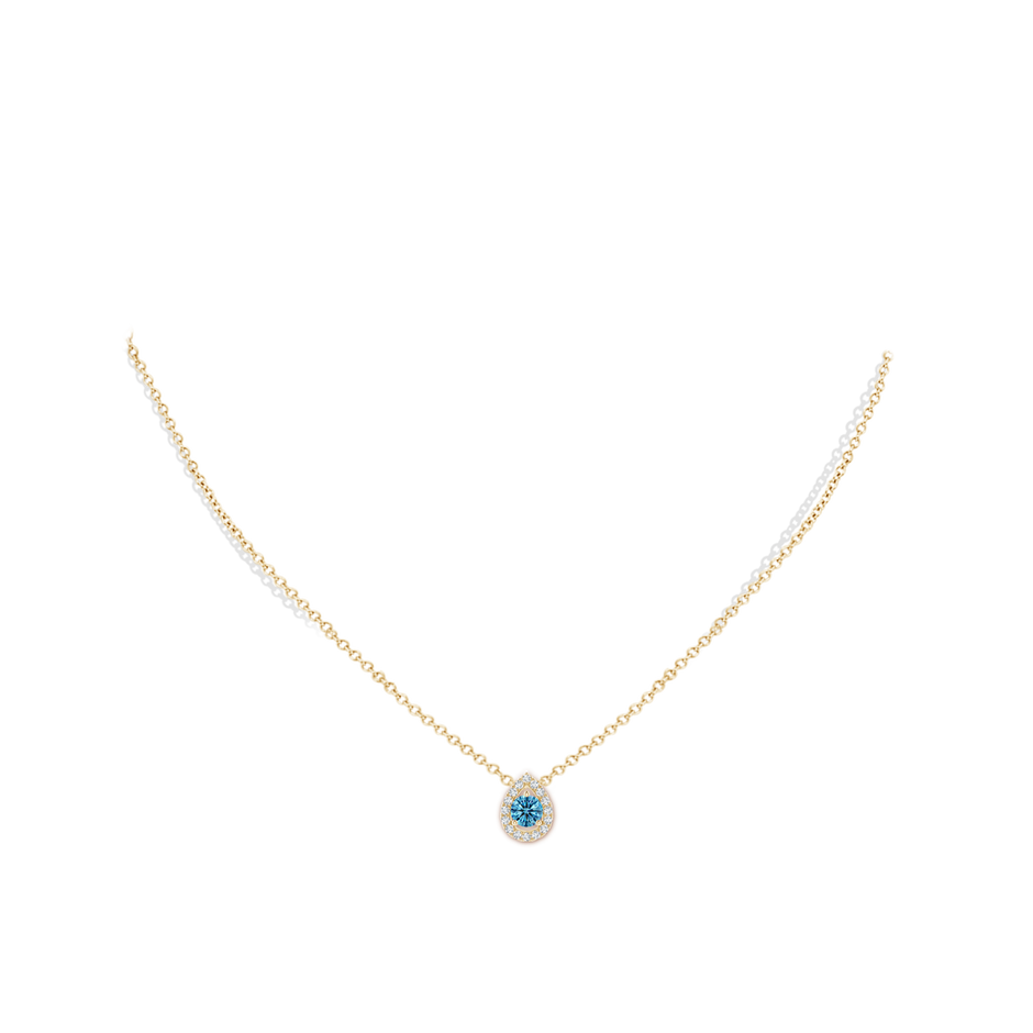5.2mm AAAA Floating Round Fancy Intense Blue Diamond Pendant with Pear-Shaped Halo in Yellow Gold pen