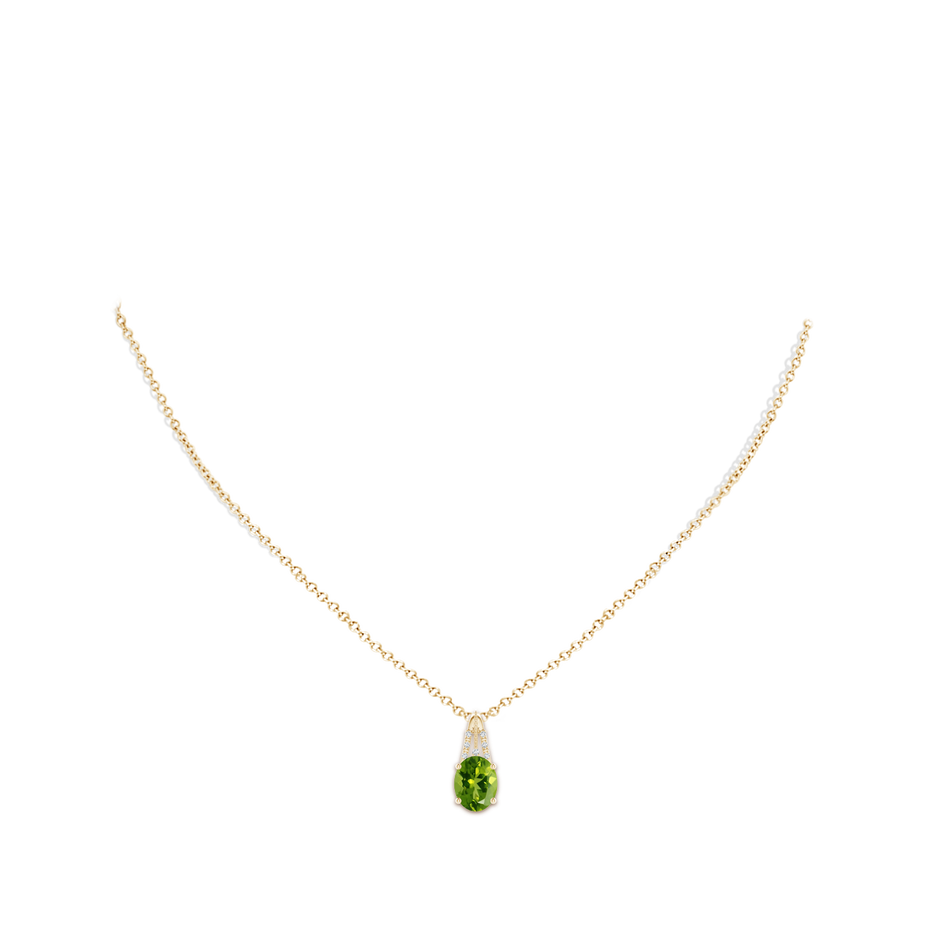 9x7mm AAAA Vintage Inspired Oval Peridot and Diamond Leo Pendant in Yellow Gold body-neck