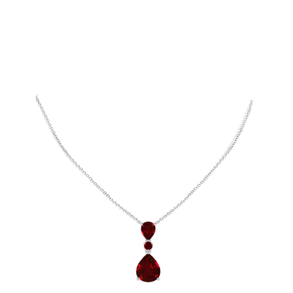 12x10mm AAAA Pear and Round Ruby Three Stone Pendant in P950 Platinum pen