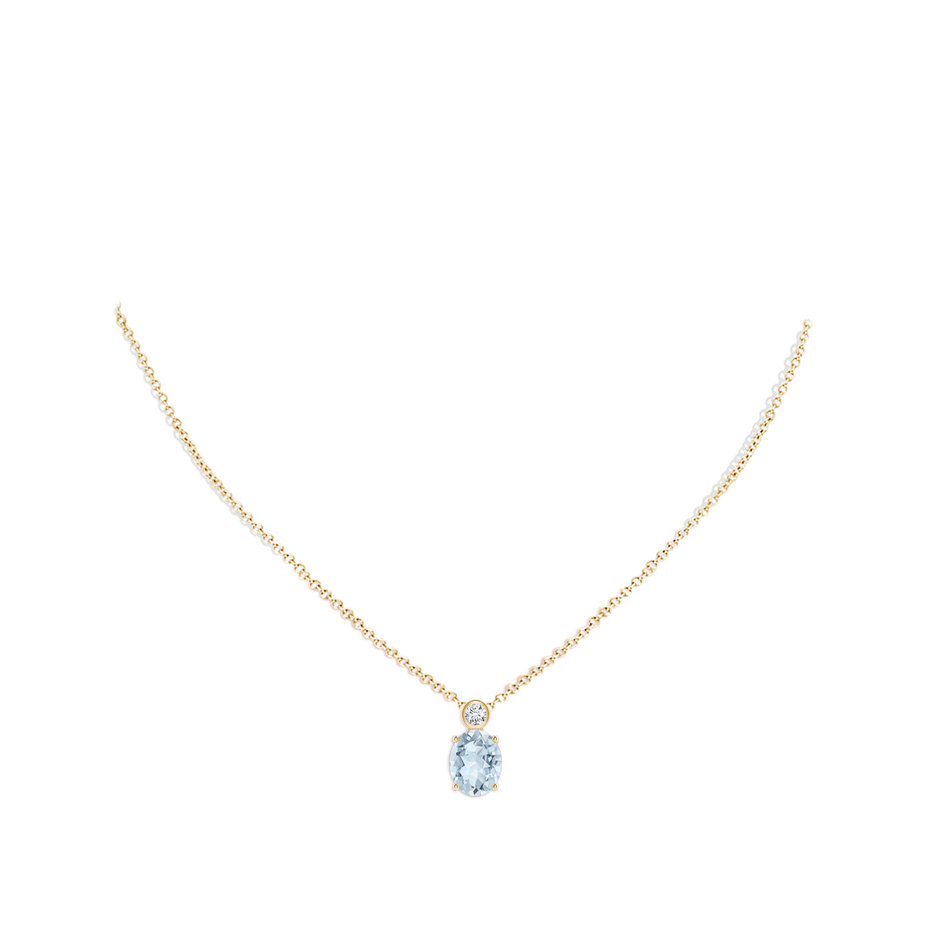 10x8mm A Oval Aquamarine Pendant with Bezel-Set Diamond in Yellow Gold pen