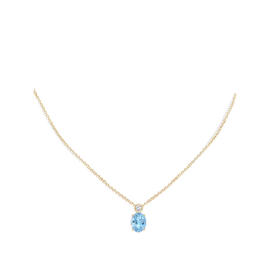 10x8mm AAAA Oval Aquamarine Pendant with Bezel-Set Diamond in Yellow Gold pen