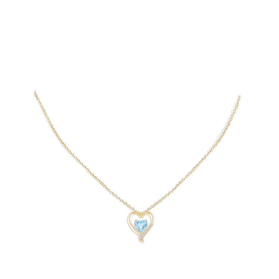 7mm AAA Aquamarine and Diamond Open Heart Pendant in Yellow Gold pen