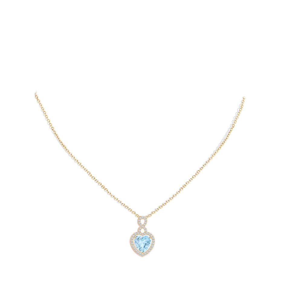 9mm AAA Aquamarine Infinity Heart Pendant with Diamond Halo in Yellow Gold pen
