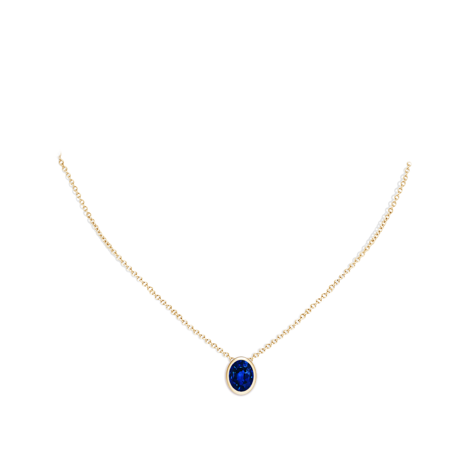 9x7mm Lab-Grown Bezel-Set Oval Blue Sapphire Solitaire Pendant in Yellow Gold pen