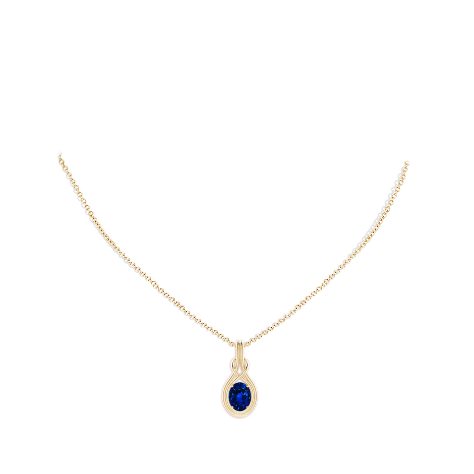 9x7mm Lab-Grown Oval Blue Sapphire Solitaire Infinity Knot Pendant in Yellow Gold pen