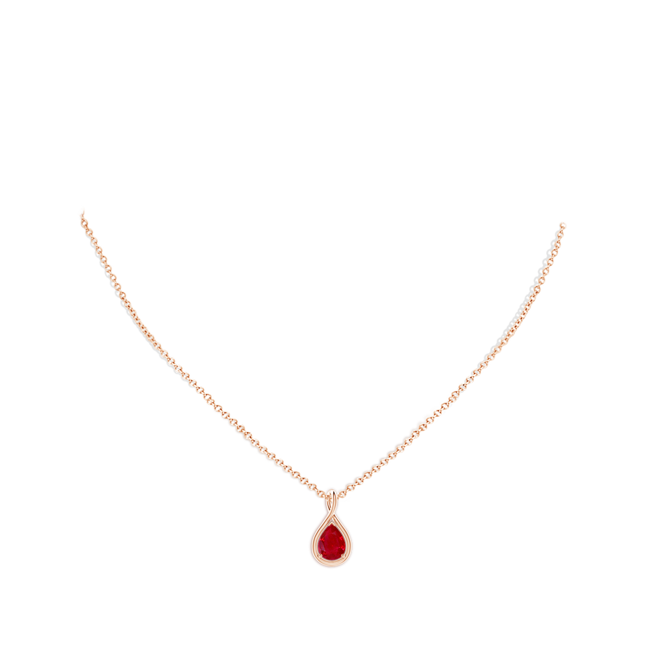 8x6mm AAA Solitaire Pear Ruby Twist Bale Pendant in Rose Gold pen