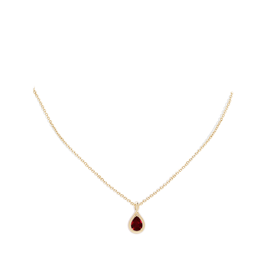 8x6mm AAAA Solitaire Pear Ruby Twist Bale Pendant in Yellow Gold pen