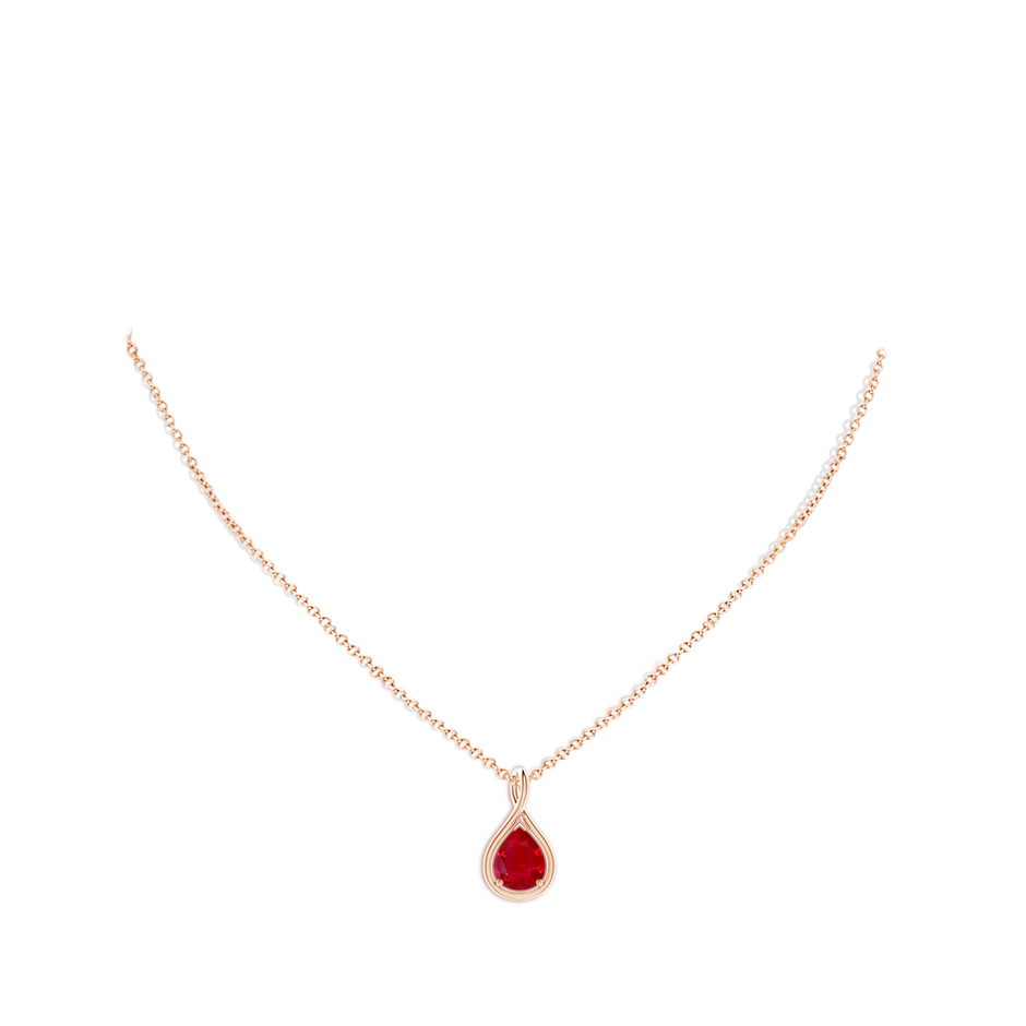 9x7mm AAA Solitaire Pear Ruby Twist Bale Pendant in Rose Gold pen