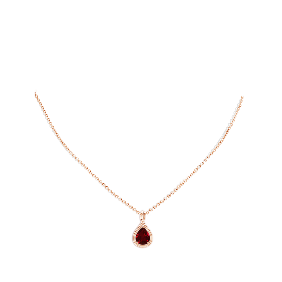 9x7mm AAAA Solitaire Pear Ruby Twist Bale Pendant in Rose Gold pen
